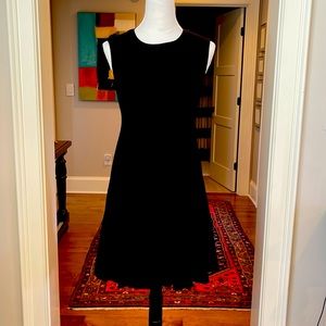 LBD - sleeveless black dress with flowy skirt